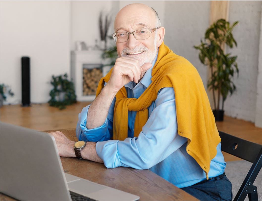 Senior man on laptop